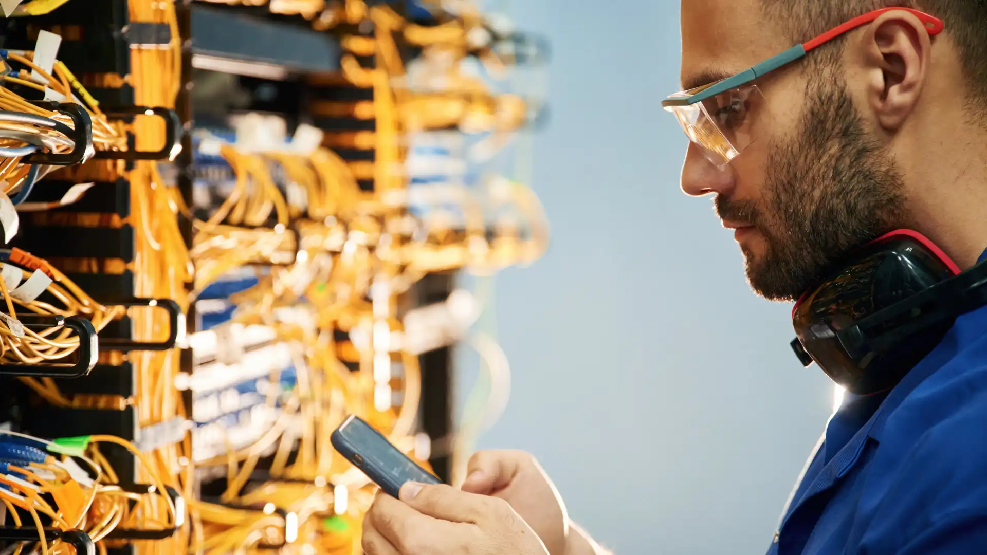 holding-smartphone-young-man-is-working-with-inte-2025-03-18-20-44-17-utc